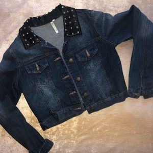 Dark wash jean jacket with leather and stud detail